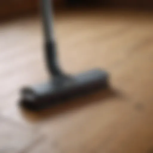 Wood floor cleaning tools neatly arranged on a wooden surface