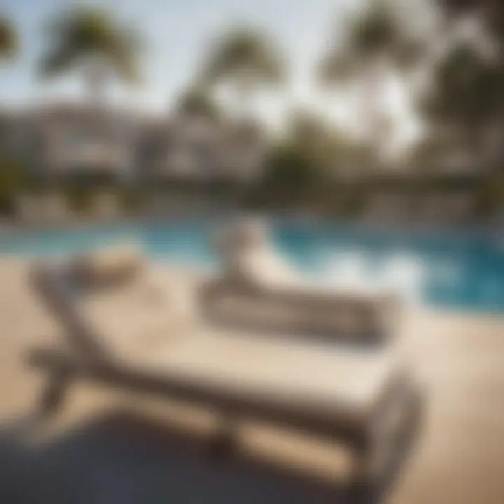 Luxurious pool area with sun loungers at Presidio Apartments