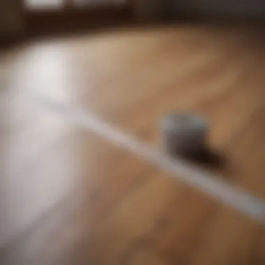 Measuring tape laid out on a wooden floor