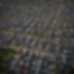 Aerial view of a bustling urban neighborhood showcasing residential properties.