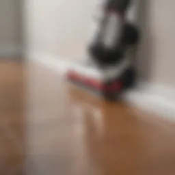 A vacuum designed for cleaning baseboards in action